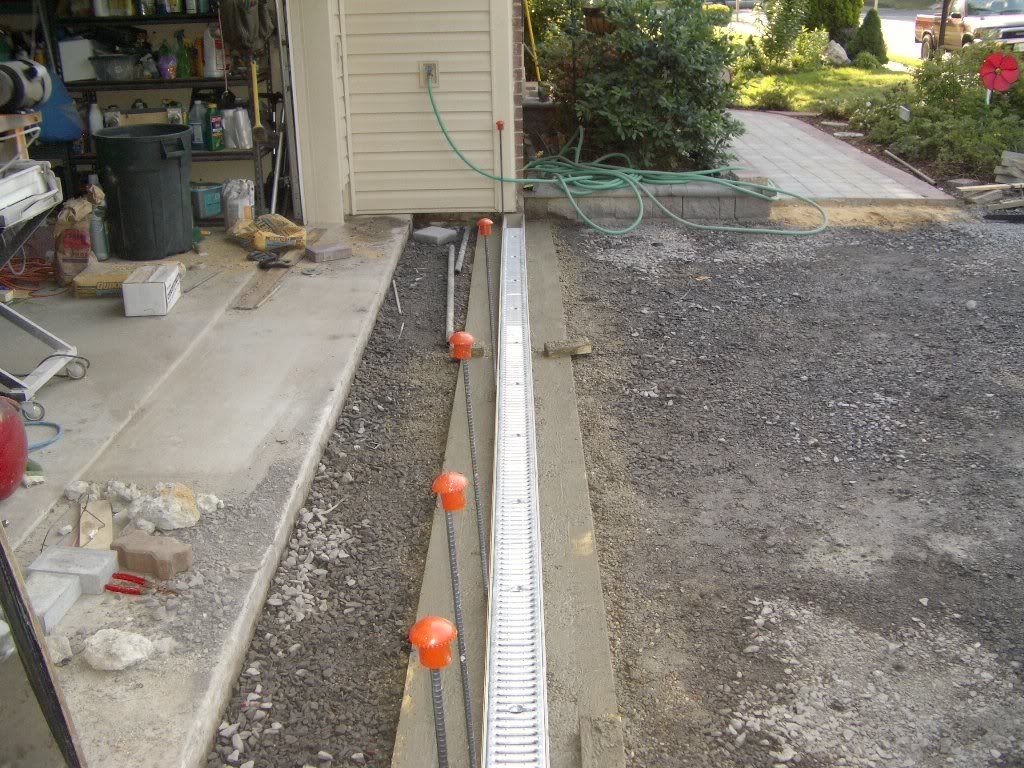 Paver Driveway Trench Drainage System Photo by jmehomeimprovement